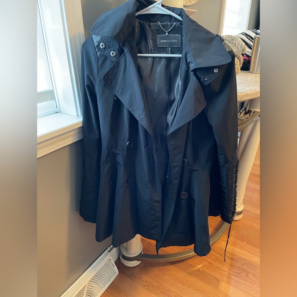 BCBG black nylon light weight jacket with some leather on the sleeves